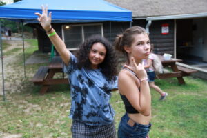 Two young girls posing for a picture at Camp Blanchard in Marlborough, MA