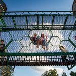 Tri-Community YMCA Playground with children playing
