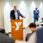 Speaker addressing attendees at the YMCA of Central Massachusetts community event